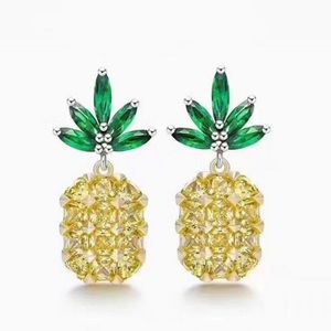 Rhinestone gold & green pineapple pierced earrings